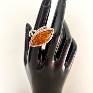 Silver ring with amber